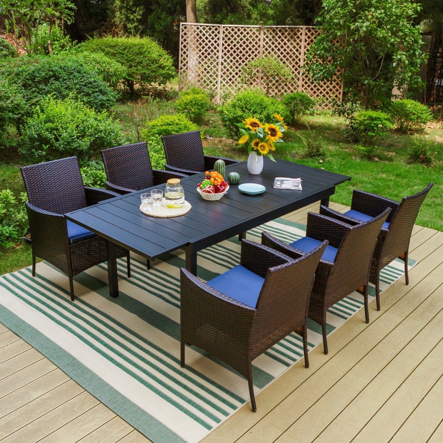 Captiva Designs 7pc Patio Slat-top Expandable Metal Dining Table & Armrest Wicker Chairs with Cushions